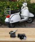 Electric Bike Battery Lock And Key Kit with metal lock, silver color, 20mm size, displayed on table, scooter in background