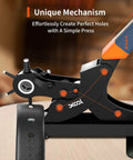 Close-up of rotary leather hole punch kit creating holes in a black leather belt, showcasing ergonomic handle and multiple size punches.