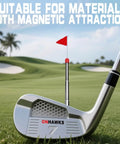 Magnetic Golf Alignment Rods With Telescopic Sticks on iron club at golf course, aiding club face alignment and impact visualization.