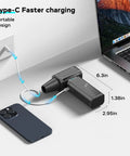 Electric Portable Air Duster with Brushless Motor charging via Type-C cable next to laptop and smartphone.
