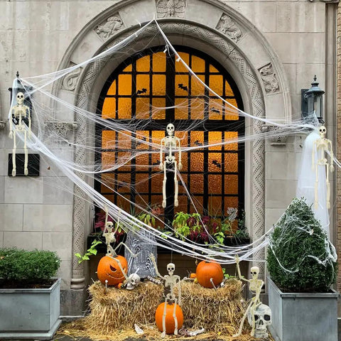 Six 16 Inch Full Body Poseable Skeletons With Movable Joints For Halloween Indoor Outdoor Spooky Decor, on porch display
