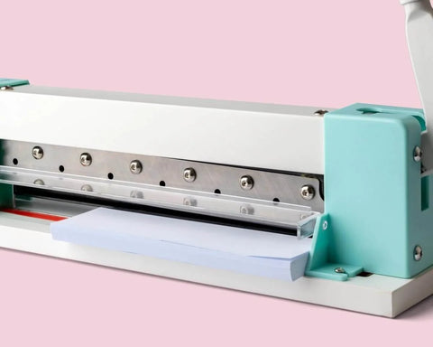 Side view of Heavy Duty Guillotine Paper Cutter for 1 Inch Thick Stacks with precision alignment and easy operation handle.