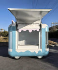 Front view of Fully Equipped Mobile Food Trailer Kitchen for Fast Food And Dessert Concession Cart at event.