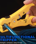 Yellow coax cable stripping tool in use