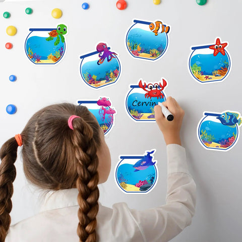 Girl using 160 Ocean Animals Name Tag Stickers Set With Eight Cute Sea Creature Designs for Back To School name labeling