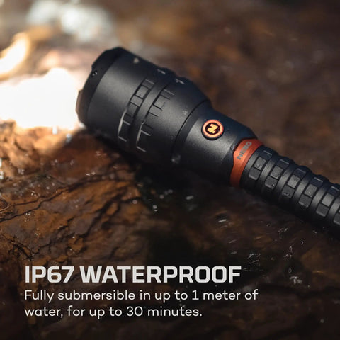 12K Lumen Flashlight With Built In USB Power Bank submerged in water showcasing IP67 waterproof capability.