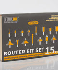 15 Pcs Router Bit Set With 1 Quarter Inch Shank High Carbide Router Bits Kit packaging in a wooden box, front view.