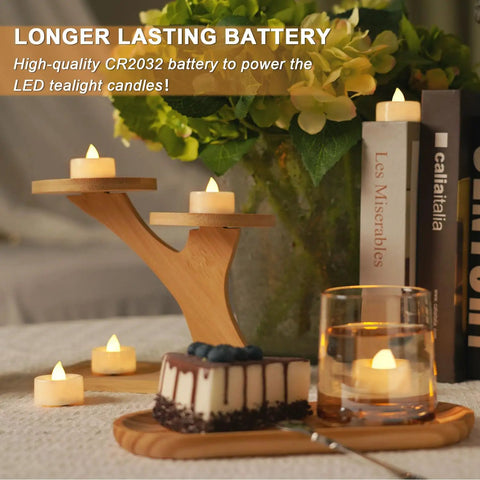 24 Pack Flameless LED Tea Lights Battery Operated Warm White Flickering Mini Candles on table with decor and cake