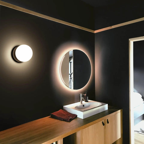 Matte Black Modern Globe Wall Sconce 1 Light With Opal Glass Shade in modern bathroom