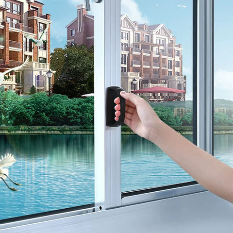 Hand using 6 Pack Self Stick Cabinet Handles And Drawer Pulls With Adhesive on a glass window, showcasing drill free installation