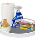 Set Of Two 12 Inch Non Skid Lazy Susan Organizer Smooth Spinning Turntable For Pantry Cabinet Kitchen Storage Game Changer With Super Grippy Rubber Base And Ball Bearings with cleaning supplies and sponges on a white platform.