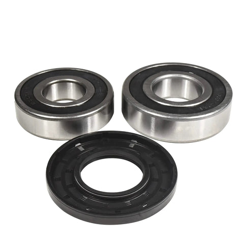 Frigidaire Front Load Washer Bearing And Seal Kit Swaps Exhausted Bearings And Crushes The Shrieking Noise On Ftf530 Models, showing two metal ball bearings and one fluid seal.