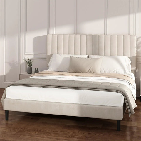 Super Soft King Velvet Bed Frame With Channel Tufted Headboard In Classic Beige for a modern bedroom with pillows and bedding.
