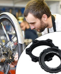 Mechanic using Beefy Center Lock Bike Rotor Tool for upgrading ride with durable aluminum adapters and high performance brake rotors