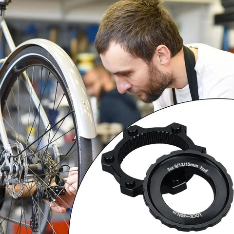 Mechanic using Beefy Center Lock Bike Rotor Tool for upgrading ride with durable aluminum adapters and high performance brake rotors