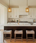 Handcrafted Boho Rattan Plug In Pendant Light With Six Watt Led Bulb And Warm 3000k Glow featuring dimmer hung over kitchen island.