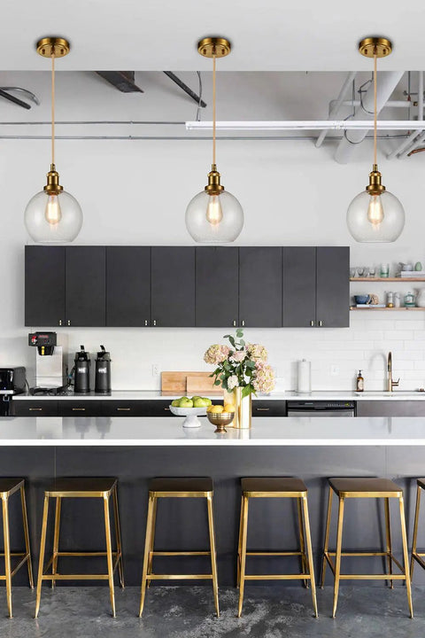 Modern Brass Seeded Glass Pendant Light With Dimmable Hanging Fixture in kitchen over island with bar stools
