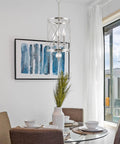 Modern Dope 3-Light Geometric Lantern Chandelier in Brushed Nickel Finish With Cylinder Trellis Cage And Crystal Orb Finial over dining table