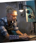 Woman wearing Grab These Heavy Duty Cut Resistant Wrist Sleeves For Men And Women while working with machinery.