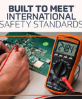 MM200 Digital Multimeter Auto Ranging 6000 Count Meter measuring circuit board voltage with red probes visible on display