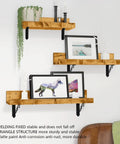 Heavy Duty Decorative Shelf Brackets 5 By 3.5 Inch Matte Black Metal Corner Supports Two Hundred Pounds Built Like A Tank Rust Proof Wall Mount Hardware For Easy Home Organization Two Pack on wooden shelves holding artwork.