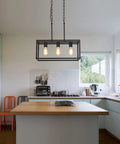 Three Light Black Linear Chandelier for Modern Dining Room and Kitchen Island Bar Rectangle Farmhouse Pendant Light Industrial Style Fixture with UL Listed hanging above a kitchen island in a bright room