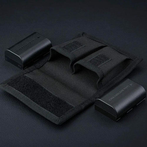 Durable Camera Battery Pouch Case For 2 Batteries With Zipped Card Pocket, shown open with two batteries beside it