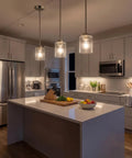 Kitchen with Winslow 7.5 Inch Mini Kitchen Pendant Light with Clear Seeded Glass in Brushed Nickel over island