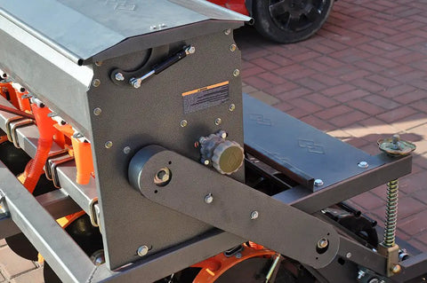 Side view of Workhorse 60 Inch 3 Point Seeder For Category One Hitches With 10 Seed Rows and adjustable depth mechanism.