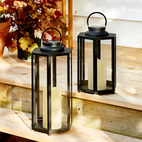 Outdoor Solar Powered Lantern With Flameless Candle For Porch Or Patio on wooden steps