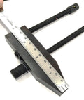 Close-up of woodworking parallel clamp vise with ruler measuring 4 inch jaws, ideal for DIY projects and precision clamping.