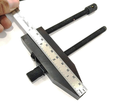 Close-up of woodworking parallel clamp vise with ruler measuring 4 inch jaws, ideal for DIY projects and precision clamping.