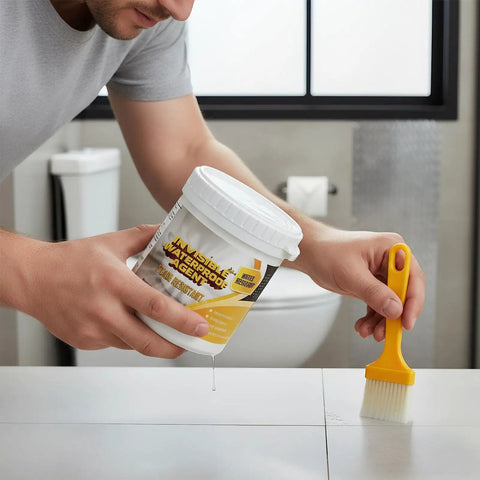 Hand applying Heavy Duty Roof Sealant Waterproof Invisible Coating for sealing leaks on a tiled surface.