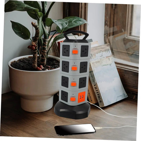 Heavy Duty Usb Power Strip With Secure Outlet Protectors Multi Port Smart Charger Fireproof Build in grey color beside a plant.