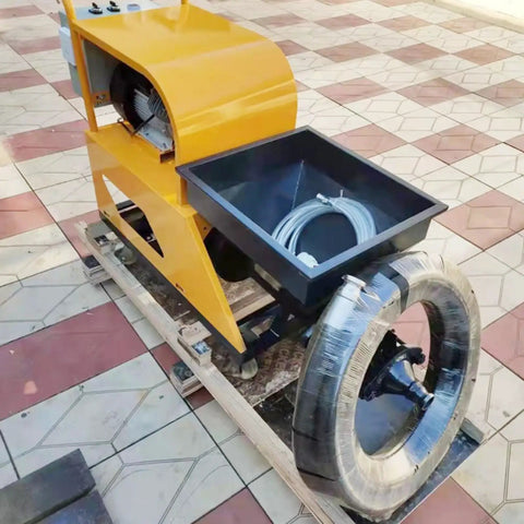 Portable Mortar Plastering Spraying Machine For Sand Cement Render Gypsum Putty Quick Wall Coating Construction Equipment Efficient Handheld Spray Pump, yellow compact design with mixing bowl and side wheel.