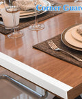 Tough As Nails Pack Of Ten Self Adhesive Vinyl Wall Corner Protectors For Zero Fuss Peel And Stick Mounting on a table edge.