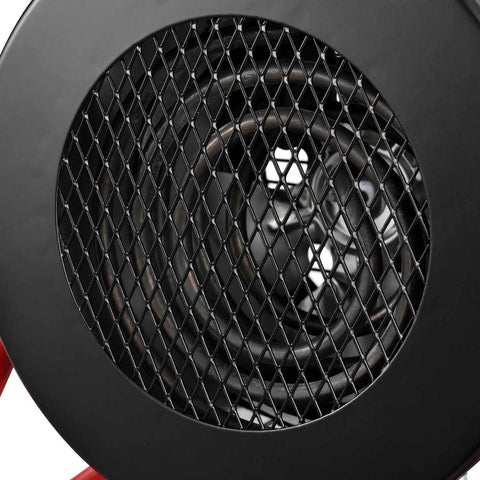 Close-up of Portable Electric Space Heater With Built In Thermostat And Ergonomic Handle 1500 Watt 5120 BTU 120V Compact grille