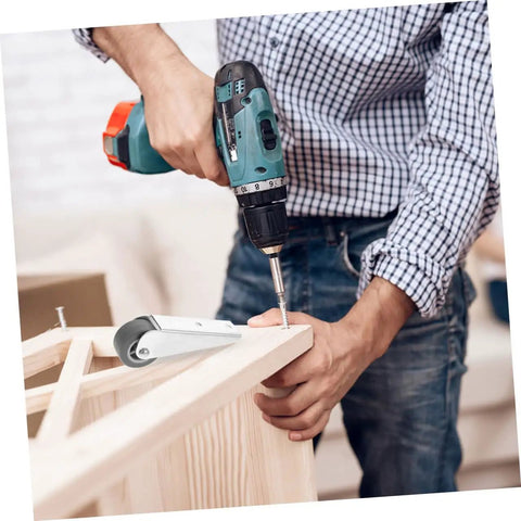 Man using a drill to install Smooth As Butter Sliding Door Rollers Straight Up Sturdy Barn Door Wheels Heavy Duty Galvanized Nylon Casters.
