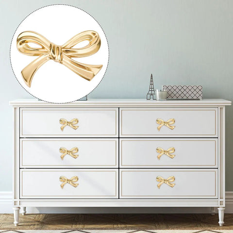 White dresser with Bow Shape Cabinet Knobs Set Of 6 Brass Vintage Gold Finish Drawer Pulls For Dresser Kitchen Cupboard Wardrobe Decor Bow Hardware With Screws And Easy Install installed.