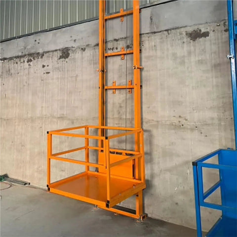 Compact Cargo Elevator For Home And Workshop With 500Kg Capacity, orange steel frame against concrete wall