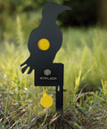 Auto Reset Metal Eagle Target For Air Rifles Outdoor Backyard Plinking Practice For 177 And 22 Caliber Pellets visible in grass