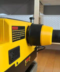 Close-up of a two and a half inch hose adapter for planer dust port fits 735 and 735X, showing quick friction fit connection.