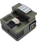 Gowenic Fiber Optic Hot Melt Cutting Machine With 0.6 Degree Cleaver, showing a compact green handheld device used for precise fiber cutting.