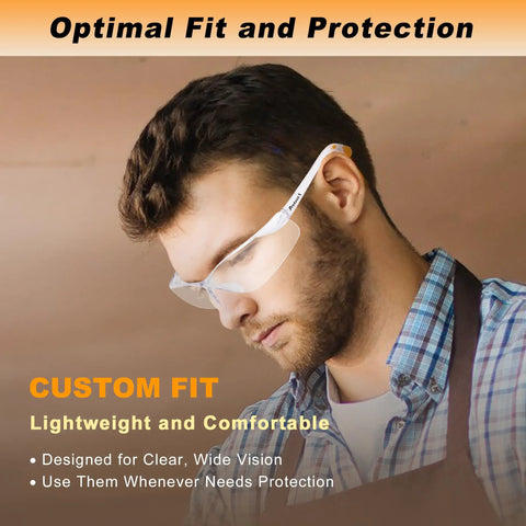 Man wearing 12-Pack Anti Fog Scratch Resistant Safety Glasses For Men And Women With Wraparound Clear Lenses Non Slip Orange Rubber Grips Lightweight Polycarbonate Frames ANSI Z87.1 Rated For All Day Work in workshop