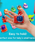 Hand holding red car from Safe Pull Back Cars Toy Set For Toddlers Ages 1 2 3 12 Construction Vehicle Cars Play Pack Educational Baby Toys