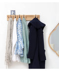 Heavy Duty Wall Mounted Coat Rack With Five Smooth Glide Metal Hooks For Mudroom Bedroom Setup Clothes Hats Towels And Everyday Carry Essentials To Keep Your Space Looking Clean And Organized Today, displaying various garments.