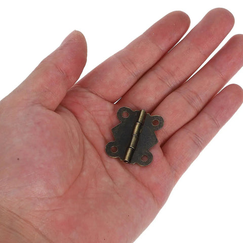 Antique Decorative Butterfly Hinges Set Of 24 For Jewelry Boxes And Cabinets, iron hinge on hand for size reference