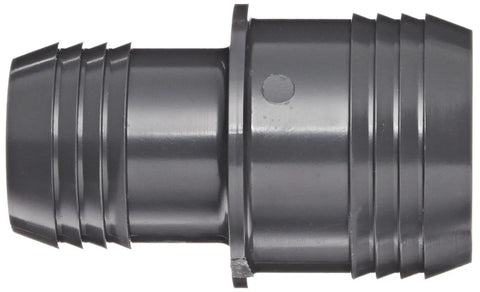 PVC Tube Fitting Coupling 1 In By 1/2 In Barbed Schedule 40 Gray For PE Pipe Durable Chemically Resistant Connector close-up view