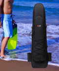 Long Fins Bag For Scuba Gear And Snorkel Kit, standing on sandy beach with blue waves, showcasing size and design