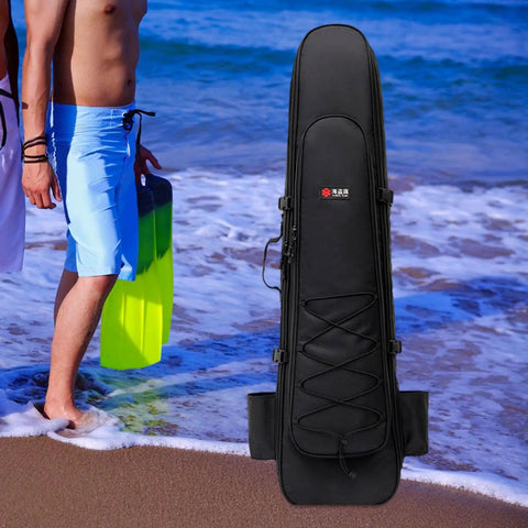Long Fins Bag For Scuba Gear And Snorkel Kit, standing on sandy beach with blue waves, showcasing size and design